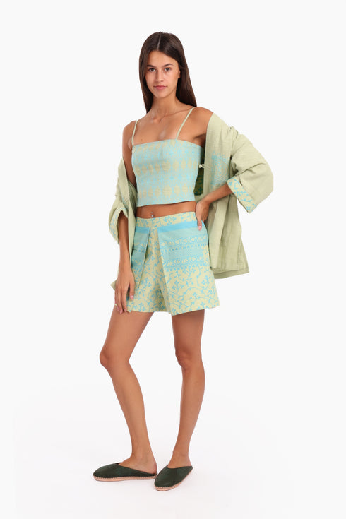 Embroidered short top in linen with adjustable straps